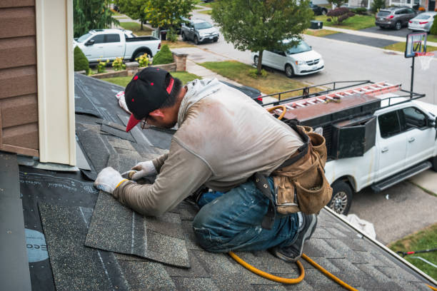 Professional Roofing technician working in Macedonia, IA